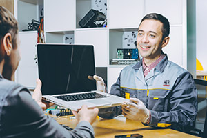 Hartford Technology Rentals representative providing Chromebook rental service
