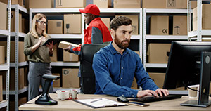 Hartford Technology technician configuring rental laptops
